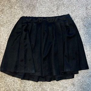 Pleated mini black skater skirt